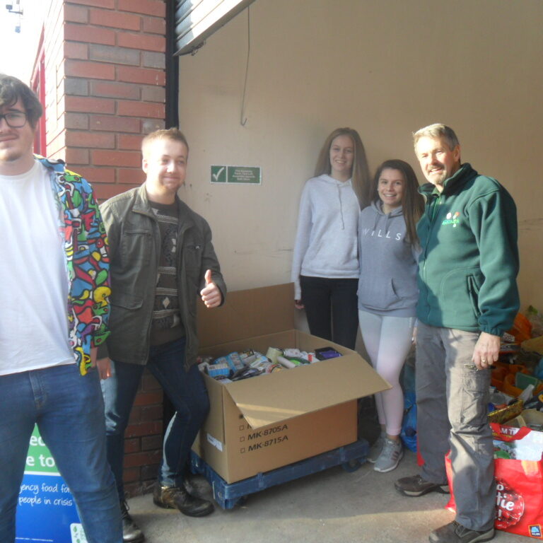 Students on childcare course deliver parcels to local food bank